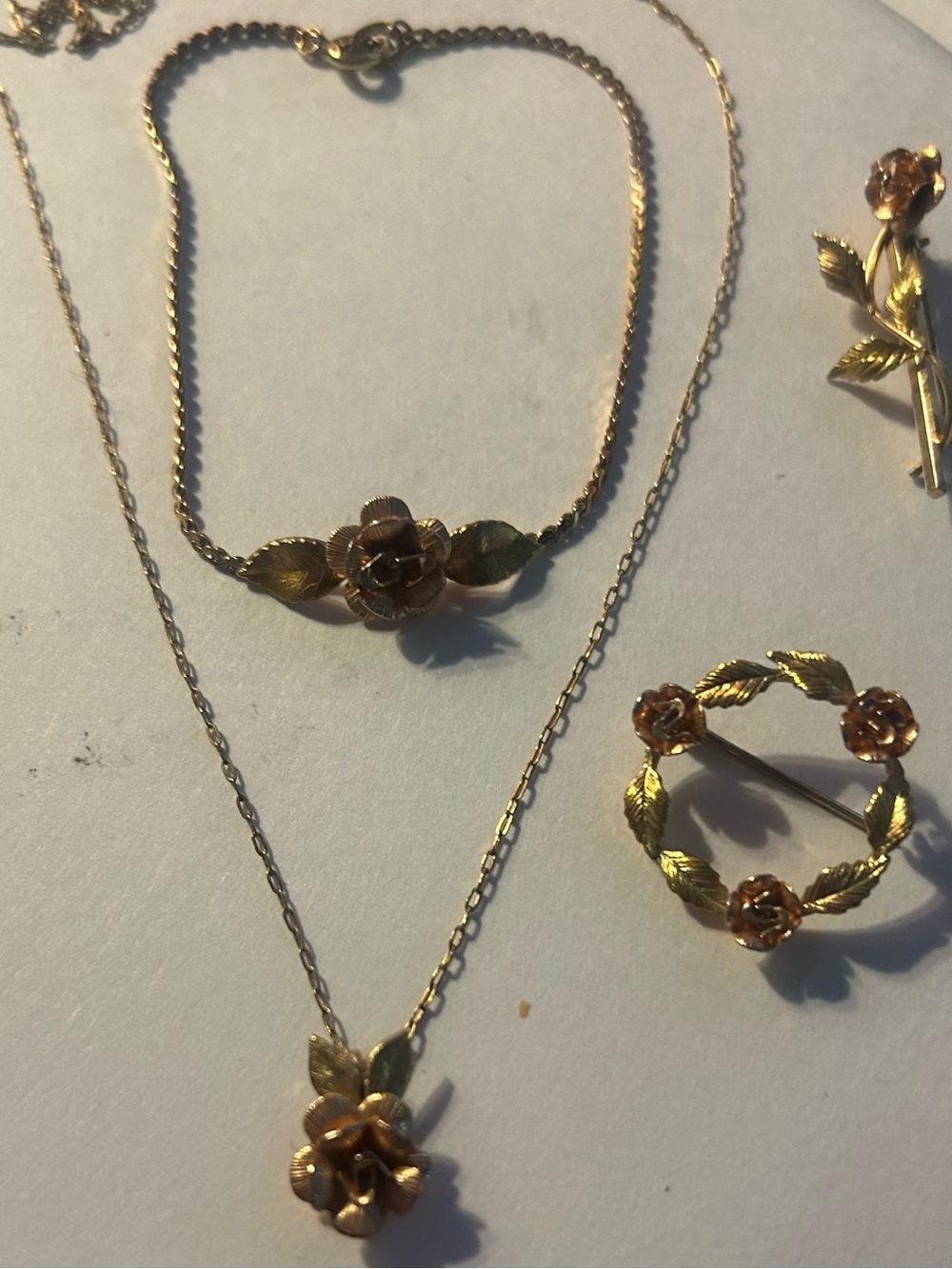 Necklace and bracelet with two sets of pins . All marked